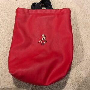 Red and black leather wine holder cushioned interior carries 2 bottles